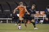 Forge FC midfielder Noah Jensen (left) vies for the ball with Cavalry FC defender Daan Klomp (4) during Canadian Premier League finals soccer action in Hamilton on Saturday, Oct. 28, 2023. Defender Klomp, his club career stalling in his native Netherlands, was considering quitting football for a day job in 2020. Then Cavalry FC called. THE CANADIAN PRESS/Nick Iwanyshyn
