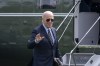 President Joe Biden walks from Marine One as he arrives on the South Lawn of the White House in Washington, Monday, Nov. 4, 2024. (AP Photo/Ben Curtis)