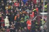 Police officers and paramedics carry a stretcher down the stands during a medical emergency during the Champions League opening phase soccer match between Bayern Munich and SL Benfica, in Munich, Germany, Wednesday, Nov. 6, 2024. (AP Photo/Matthias Schrader)