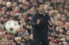 Leverkusen's head coach Xabi Alonso gestures from the touchline during the Champions League opening phase soccer match between Liverpool and Bayer Leverkusen at Anfield in Liverpool, England, Tuesday, Nov. 5, 2024. (AP Photo/Jon Super)
