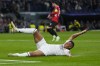 Real Madrid's Kylian Mbappe reacts during the Champions League opening phase soccer match against AC Milan at the Santiago Bernabeu stadium in Madrid, Spain, Tuesday, Nov. 5, 2024. (AP Photo/Manu Fernandez)