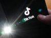 The TikTok startup page is displayed on an iPhone in Ottawa, Monday, Feb. 27, 2023. THE CANADIAN PRESS/Sean Kilpatrick