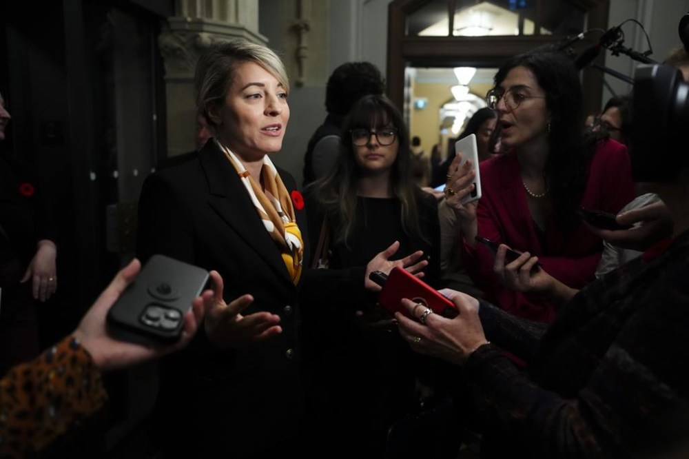 Minister of Foreign Affairs Melanie Joly arrives to a caucus meeting on Parliament Hill in Ottawa on Wednesday, Nov. 6, 2024. Foreign Affairs Minister Mélanie Joly says Canada will stand firm on its plan to reign in the number of newcomers despite concerns about an influx of migrants following the re-election of U.S. president Donald Trump. THE CANADIAN PRESS/Sean Kilpatrick