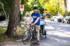 MIKAELA MACKENZIE / FREE PRESS
	
Andrew Kohan in the bike lane along Assiniboine Avenue (near where a moving vehicle recently blocked the route) on Wednesday, Oct. 2, 2024. While parking in bike lanes is illegal, it isnÕt often ticketed.

For Malak story.
Winnipeg Free Press 2024