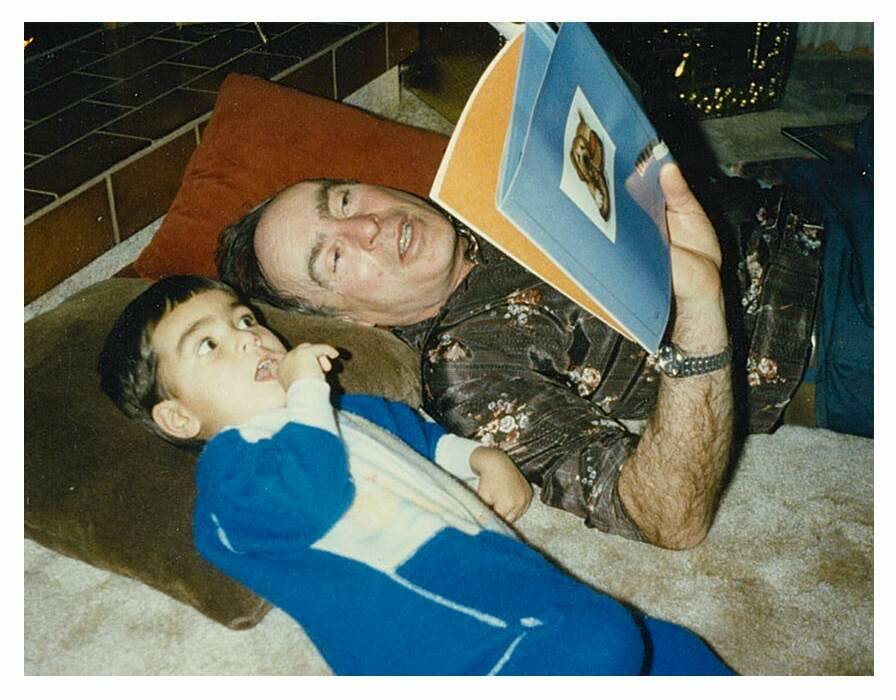 SUPPLIED
Sutherland, seen here reading to his nephew Naim, enjoyed spending time with all the children in his life.