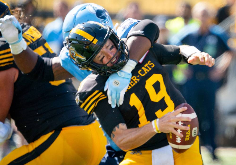 PETER POWER / THE CANADIAN PRESS FILES
Hamilton Tiger Cats quarterback Bo Levi Mitchell is leading the CFL in several categories.