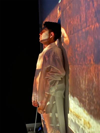 MIKA PHOTO
                                Artist Anto(n) Astudillo in a 
performance titled A Body Surrenders
