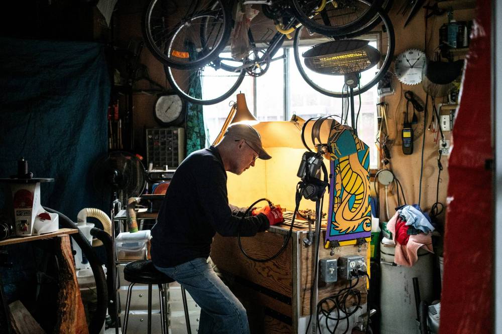 MIKAELA MACKENZIE / WINNIPEG FREE PRESS
Jeff Nelson, a self-described home handyman, does most of his woodworking in a corner of his garage.
