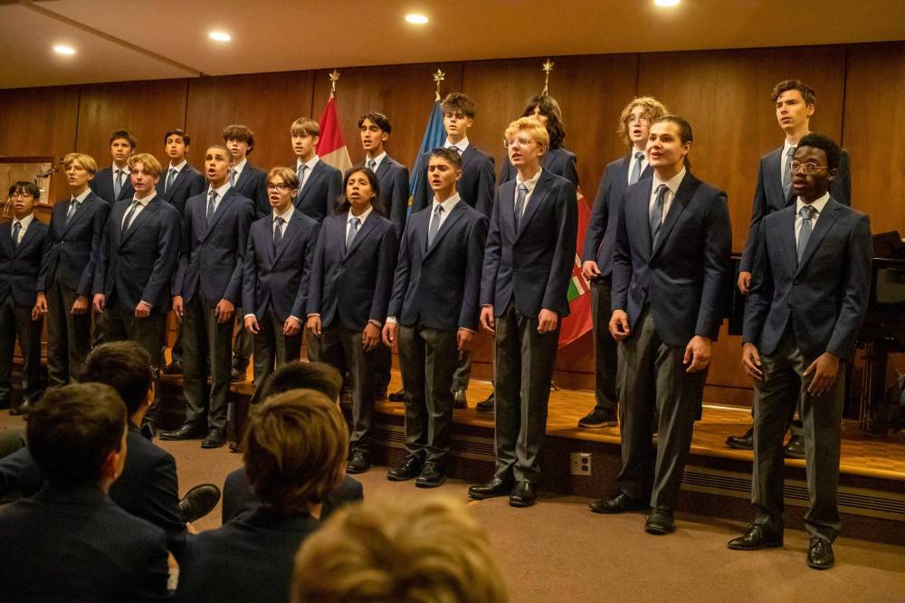 The choir's senior ensemble sings Regina Coeli by Dan Davison during a performance at Government House. (Brook Jones / Free Press)