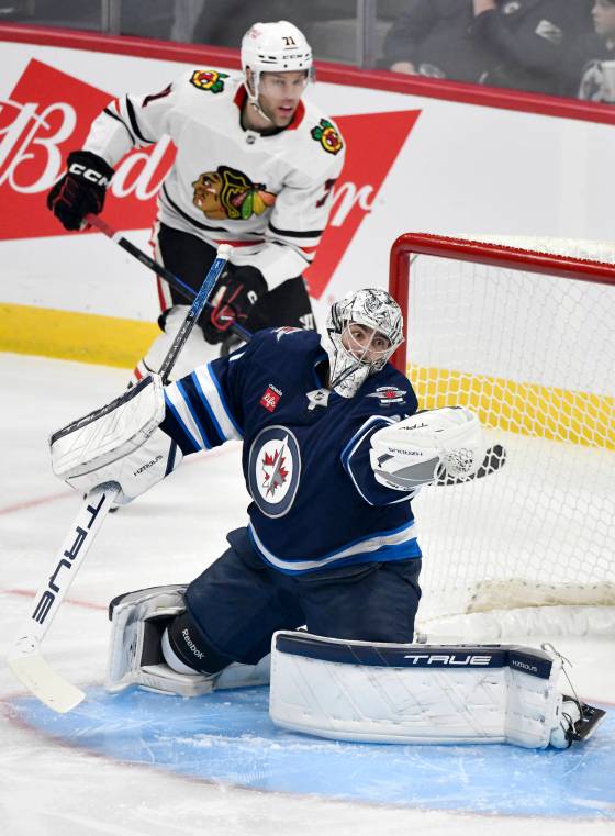 Fred Greenslade / THE CANADIAN PRESS Connor Hellebuyck made 26 saves against the Chicago Blackhawks.