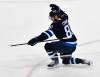 Winnipeg Jets’ Kyle Connor (81) celebrates his game-winning goal against the Minnesota Wild during overtime NHL hockey action in Winnipeg, Sunday, Oct. 13, 2024. (Fred Greenslade / The Canadian Press)