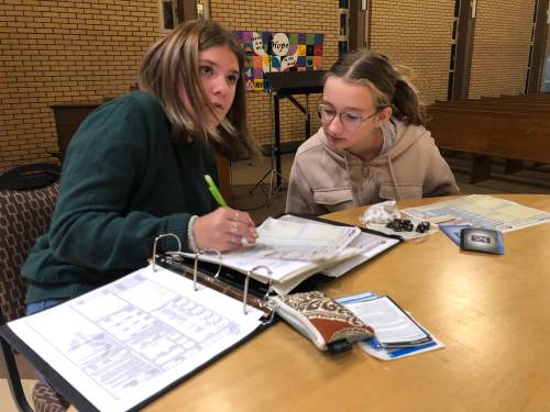 JOHN LONGHURST / FREE PRESS
                                Kiana (left) and Nori play Dungeons & Dragons at River East Church.
