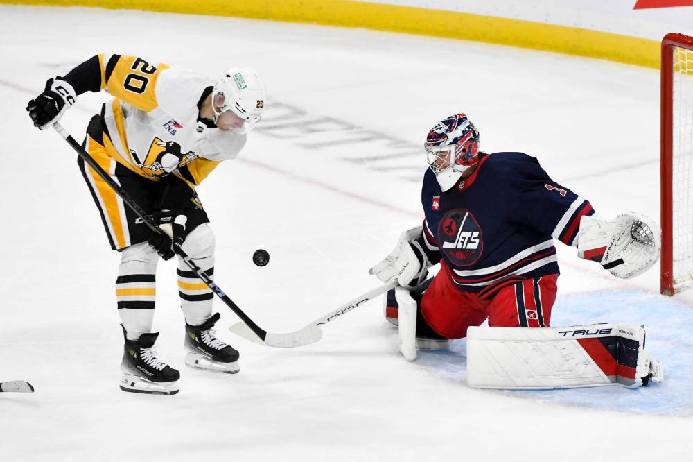 Fred Greenslade / THE CANADIAN PRESS
Winnipeg Jets’ goaltender Eric Comrie made his first start of the season Sunday in the Jets’ 6-3 triumph over the visiting Pittsburgh Penguins.