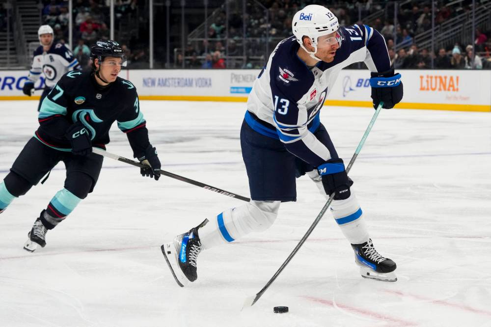 Lindsey Wasson / The Associated Press
Winnipeg Jets winger Gabriel Vilardi rips a shot as Seattle Kraken centre Yanni Gourde looks on during the third period.