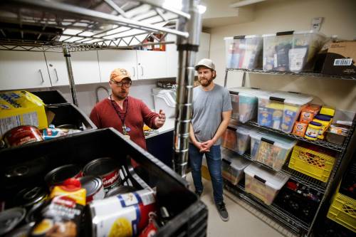 JOHN WOODS / FREE PRESS
                                Michael Larson, site lead, Oak Table - 1 Just City, right, and Thomas Vanderkrogt, food manager, Oak Table - 1 Just City. Vanderkrogt said he&rsquo;s had to get creative with meals given food is more expensive.