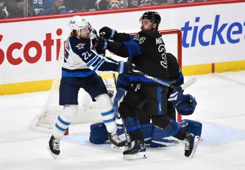 Fred Greenslade / THE CANADIAN PRESS
                                Fans hoping to watch the Jets take on the Maple Leafs on traditional cable were out of luck and wouldn&rsquo;t have seen Austin Matthews cross-check Mason Appleton in front of the Toronto net.