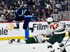 FRED GREENSLADE / THE CANADIAN PRESS FILES
                                Jets forward Morgan Barron leaps over Jon Merrill of the Minnesota Wild earlier this season. Part of the reason for the Jets’ success this season is the team’s us-against-the-world mentality.