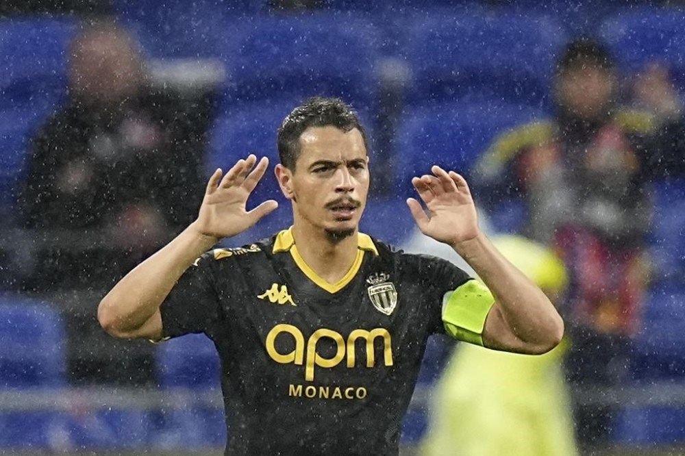FILE - Monaco's Wissam Ben Yedder celebrates scoring his second goal during a French League One soccer match between Lyon and Monaco at the Groupama stadium in Decines, outside Lyon, France, April 28, 2024. (AP Photo/Laurent Cipriani, File)