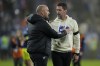FC Cincinnati head coach Pat Noonan, right, and New York City FC head coach Nick Cushing, left, talk after their first-round soccer match of the MLS Cup playoffs, Monday, Oct. 28, 2024, in Cincinnati. (AP Photo/Carolyn Kaster)