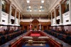 The parliamentary mace, front, is seen encased in a clear box inside the newly renovated legislative assembly in Victoria, Tuesday, Oct. 29, 2024. THE CANADIAN PRESS/Chad Hipolito