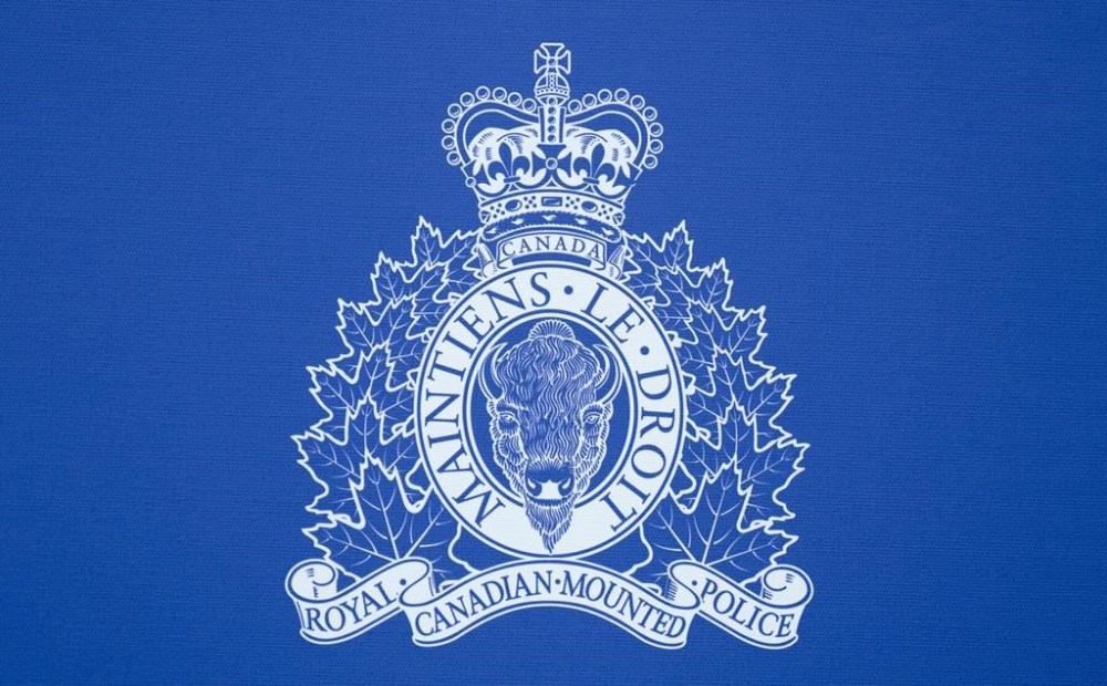 The RCMP logo is seen on the background for a news conference, in St. John's, June 24, 2023. THE CANADIAN PRESS/Adrian Wyld