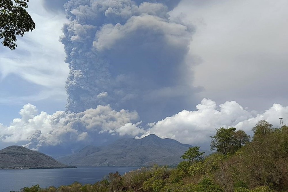 Mount Lewotobi Laki Laki spews volcanic material during an eruption in East Flores, Indonesia, Saturday Nov, 9, 2024. (AP Photo)