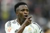 Real Madrid's Vinicius Junior celebrates after scoring his side's fourth goal during the Spanish La Liga soccer match between Real Madrid and Osasuna at the Santiago Bernabeu stadium in Madrid, Spain, Saturday, Nov. 9, 2024. (AP Photo/Jose Breton)
