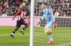 Brentford's Yoane Wissa, left, celebrates scoring their side's first goal of the game during the Premier League match at the Gtech Community Stadium, London, Saturday Nov. 9, 2024. (John Walton/PA via AP)