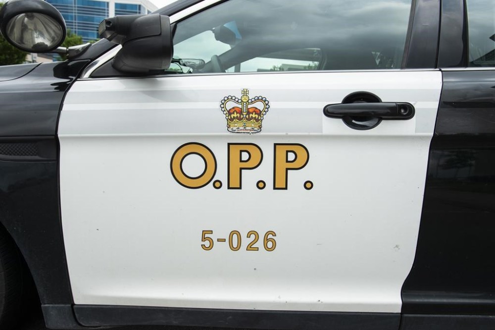 Three people are dead, and one is seriously wounded after a collision involving two vehicles on Highway 401 in Quinte West, a city in southern Ontario. An Ontario Provincial Police cruiser sits outside of a press conference in Vaughan, Ont., on June 20, 2019. THE CANADIAN PRESS/Andrew Lahodynskyj