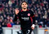 Frankfurt's Omar Marmoush celebrates after scoring his side's third goal of the game during the Bundesliga soccer match between VfB Stuttgart - Eintracht Frankfurt, at the MHPArena in Stuttgart, Germany, Sunday Nov. 10, 2024. (Tom Weller/dpa via AP)