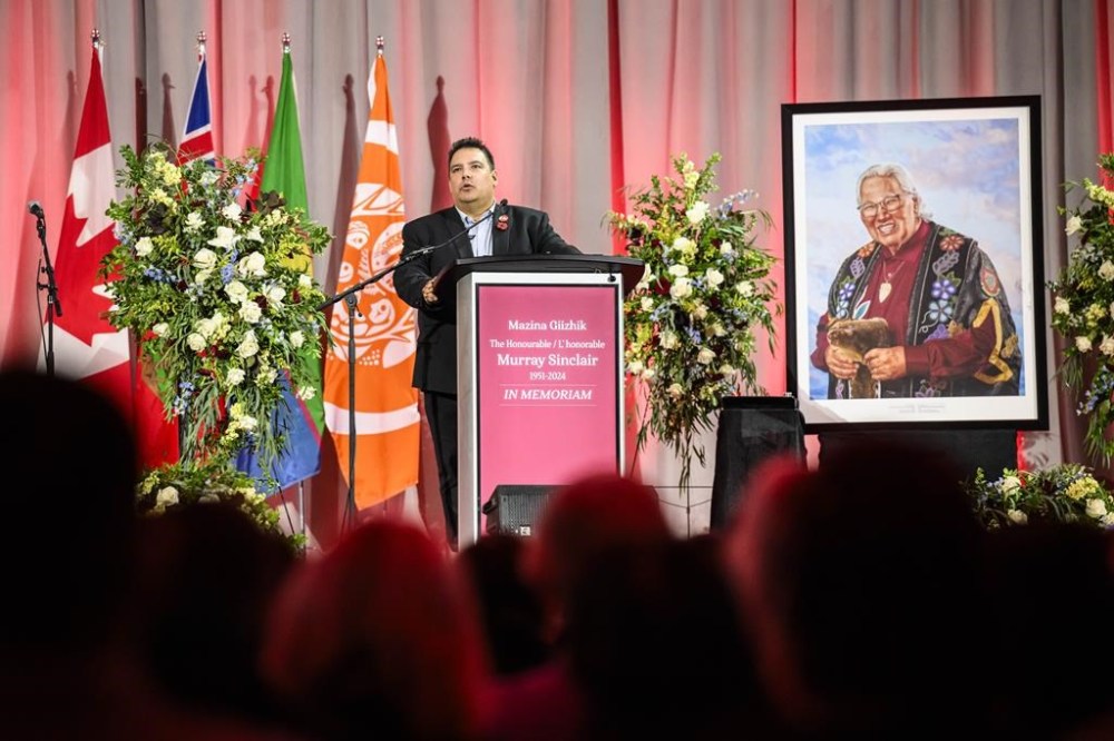 Niigaan Sinclair speaks during his father, Murray Sinclair's memorial service, who was a former judge, senator and chair of the Truth and Reconciliation Commission into residential schools, in Winnipeg on Sunday Nov. 11, 2024.
THE CANADIAN PRESS/Mike Sudoma