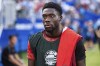 Canada captain Alphonso Davies (19) looks on before the Copa America third place soccer match against Uruguay in Charlotte, N.C., Saturday, July 13, 2024. Canada will be without captain Davies for its upcoming CONCACF Nations League quarterfinal against Suriname.THE CANADIAN PRESS/AP/Jacob Kupferman