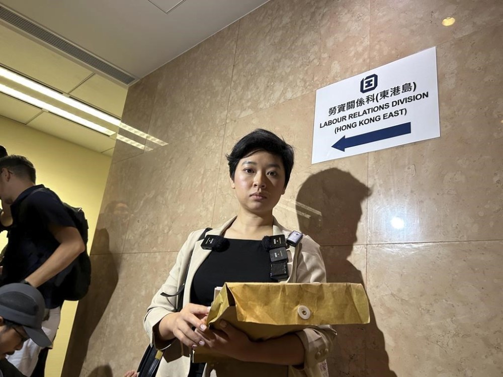 Selina Cheng, a former reporter at the Wall Street Journal, and chairperson of the Hong Kong Journalists Association speaks to media in Hong Kong on Tuesday, Nov.12, 2024. Cheng said she'll sue the publication for sacking her because she joined a trade union. (AP Photo/ Kanis Leung)