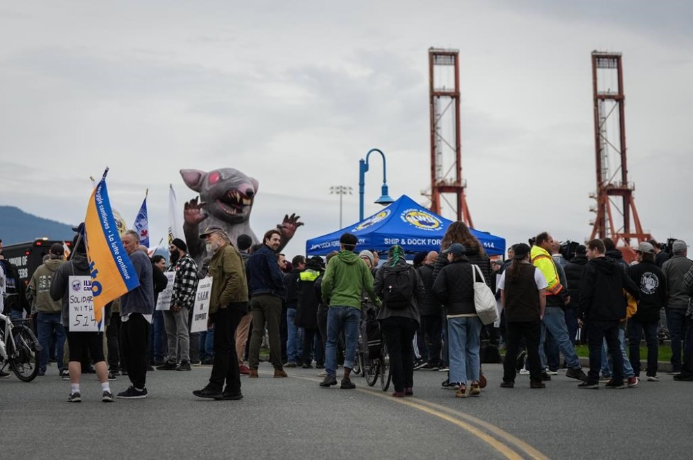 Locked out International Longshore and Warehouse Union Local 514 port workers and supporters attend a rally, in Vancouver, B.C., Friday, Nov. 8, 2024. THE CANADIAN PRESS/Darryl Dyck