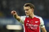 Arsenal's Martin Odegaard gestures during the English Premier League soccer match between Chelsea and Arsenal at Stamford Bridge stadium in London, Sunday, Nov. 10, 2021. (AP Photo/Kirsty Wigglesworth)