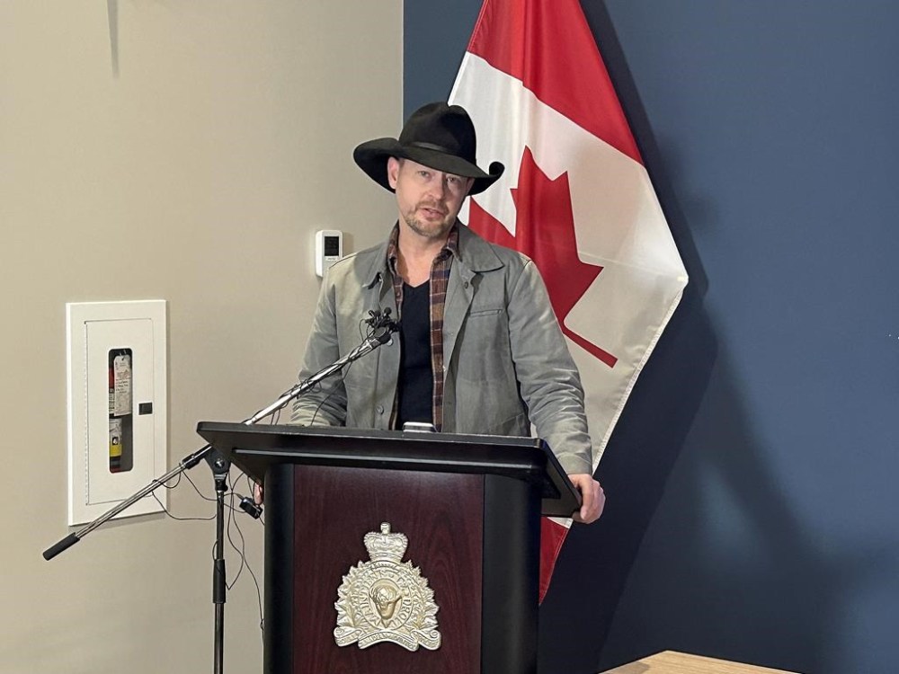 Country music star Paul Brandt, founder of Not in My City and co-chair of the Alberta Centre to End Trafficking in Persons, speaks at a news conference in Cochrane, Alta., Wednesday. RCMP say they have arrested and charged a man with sex trafficking dating back 20 years. THE CANADIAN PRESS/Bill Graveland
