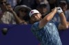 Tyrell Hatton of England hits off the first tee during the first round of World Tour Golf Championship in Dubai, United Arab Emirates, Thursday, Nov. 14, 2024. (AP Photo/Altaf Qadri)
