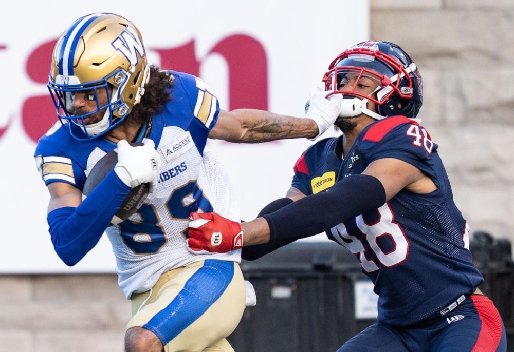 Winnipeg Blue Bombers wide receiver Kenny Lawler (89) tries to get past Montreal Alouettes defensive back Kabion Ento (48) during second half CFL football action in Montreal on Saturday, Oct. 26, 2024. Competition has always fuelled Kenny Lawler. Now the American wide receiver's insatiable drive to win is fuelling the Winnipeg Blue Bombers as they prepare to face the Toronto Argonauts in the Grey Cup on Sunday. THE CANADIAN PRESS/Christinne Muschi