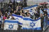 Israel supporters react following the UEFA Nations League soccer match between France and Israel at the Sea de de France stadium in Saint-Denis, outside Paris, Thursday Nov. 14, 2024. (AP Photo/Michel Euler)