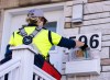 Postal workers could go on strike Friday morning if no deal is reached between the Crown corporation and the union. A Canada Post mail carrier delivers flyers on their route in Montreal on Wednesday, Nov.13, 2024. THE CANADIAN PRESS/Christinne Muschi