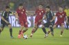 Japan's Wataru Endo, left, and Takumi Minamino, second right, battle for the ball against Indonesia's Ragnar Oratmangoen, second left, Rafael Struick, center, and Justin Hubner, right, during their 2026 World Cup Asian 3rd round qualifier soccer match at Gelora Bung Karno Main Stadium in Jakarta, Indonesia, Friday, Nov. 15, 2024. (AP Photo/Achmad Ibrahim)