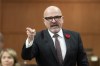 Employment, Workforce Development and Official Languages Minister Randy Boissonnault rises during Question Period, Friday, Oct. 25, 2024 in Ottawa. THE CANADIAN PRESS/Adrian Wyld