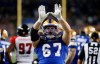 Winnipeg Blue Bombers' Chris Kolankowski (67) reacts after quarterback Dakota Prukop (12) scores the touchdown against the Ottawa Redblacks during the second half of CFL action in Winnipeg, Friday, June 10, 2022. THE CANADIAN PRESS/John Woods