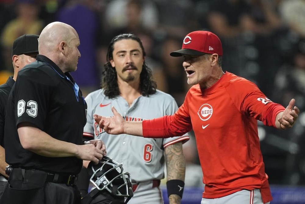 Cincinnati Reds manager David Bell, right, argues with home plate umpire Mike Estabrook, left, as Reds' Jonathan India, center, looks on in the eighth inning of a baseball game against the Colorado Rockies, Monday, June 3, 2024, in Denver. The Toronto Blue Jays have hired former Cincinnati Reds manager David Bell as vice president, baseball operations and assistant general manager.
The Blue Jays announced the move in a release Friday. (AP Photo/David Zalubowski)