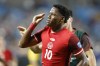Canada's Jonathan David celebrates scoring his side's second goal against Uruguay during the Copa America third place soccer match in Charlotte, N.C., Saturday, July 13, 2024. Canada, ranked 35th in the world, takes on No. 136 Suriname in the opening leg of their CONCACAF Nations League quarterfinal. THE CANADIAN PRESS/AP/Nell Redmond