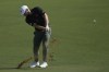 Tyrell Hatton of England plays his second shot on the 2nd hole during the second round of World Tour Golf Championship in Dubai, United Arab Emirates, Saturday, Nov. 16, 2024. (AP Photo/Altaf Qadri)