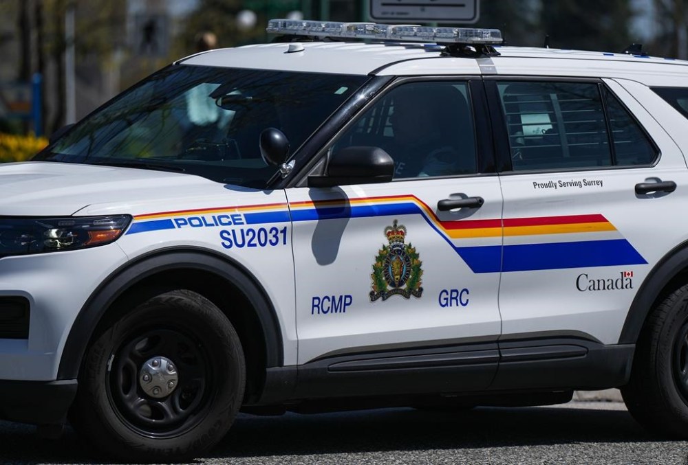 A woman and a young girl are dead after police say the SUV they were in collided with a semi that failed to stop at a rural Manitoba intersection. A RCMP police vehicle is shown in Surrey, B.C., on Friday, April 28, 2023. THE CANADIAN PRESS/Darryl Dyck