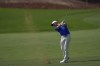 Rory McIlroy of Northern Ireland plays his second shot on the 9th hole in the final round of World Tour Golf Championship in Dubai, United Arab Emirates, Sunday, Nov. 17, 2024. (AP Photo/Altaf Qadri)