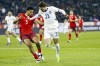Switzerland's Aurele Amenda, left, and Serbia's Dusan Vlahovic in action during the UEFA Nations League soccer match between Switzerland and Serbia at the Letzigrund stadium in Zurich, Switzerland on Friday, Nov. 15, 2024. (Michael Buholzer/Keystone via AP)