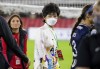FILE. Washington Spirit owner Michele Kang leaves the field after an NWSL soccer match in Washington, Saturday, Oct. 9, 2021. (AP Photo/Amanda Andrade-Rhoades, File)